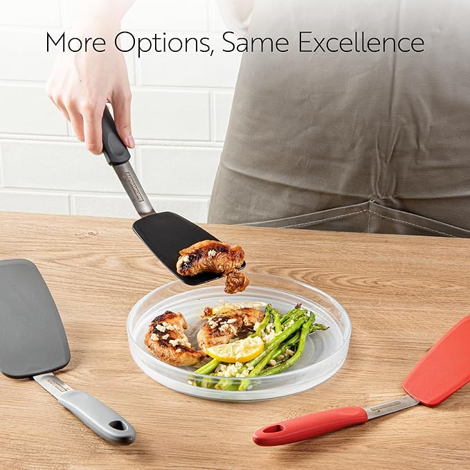 Restaurantware Comfy Grip 13.3 x 4 Inch Silicone Turner 1 Durable Cooking Turner - Stainless Steel Body Rubber Handle With Hole Red Silicone Flipper Spatula Tolerates Up To 446F Dishwashable